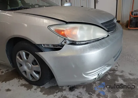 2003 Toyota Camry Le z USA, uszkodzony, nr VIN 4T1BE32K53U675331